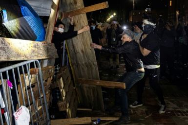 Counter-protesters attacked a pro-Palestinian encampment at UCLA before police dismantled it