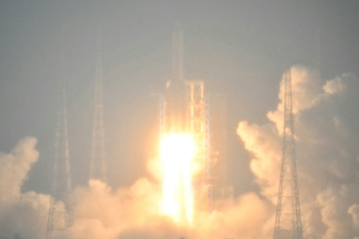 A Long March 5 rocket, carrying the Chang'e-6 mission lunar probe blasts off from the Wenchang Space Launch Centre in southern China