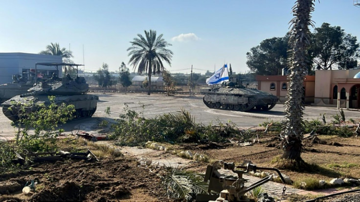 An Israeli army picture shows what it says are tanks from its 401st Brigade entering the Palestinian side of the Rafah border crossing with Egypt