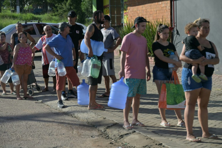 Tens of thousands of people were left stranded by impassable roads, collapsed bridges and flooded homes