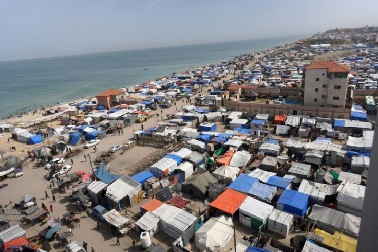 Many Palestinians are crowded into shelters along the seashore in Deir al-Balah, central Gaza