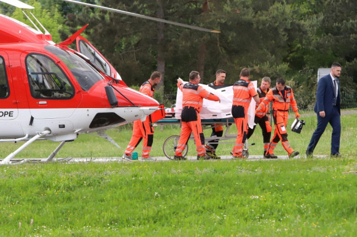 Slovak Prime Minister Robert Fico is transported from a helicopter by medics