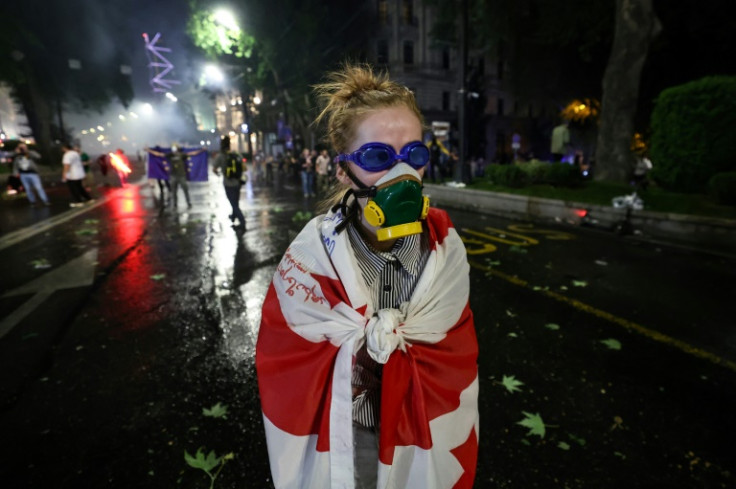Although the law has been adopted, the turmoil is far from over