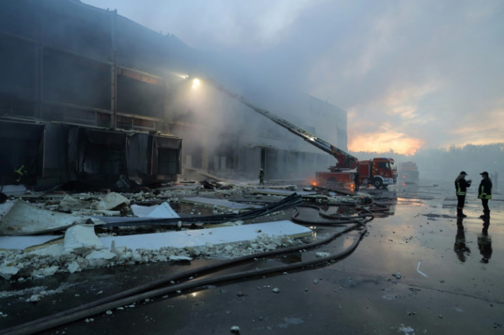 Ukrainian firefighters put out a fire in food warehouse after Russian missile strike on Odesa