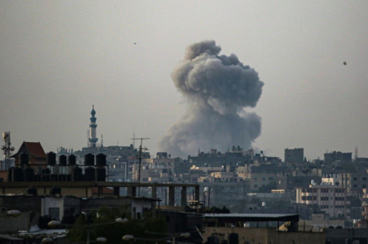 Smoke billows during Israeli bombardment in Rafah in the southern Gaza Strip on May 19, 2024