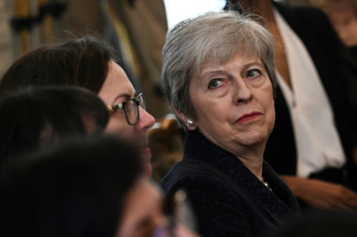Ex-PM May is among a record number of Tory MPs not standing for re-election