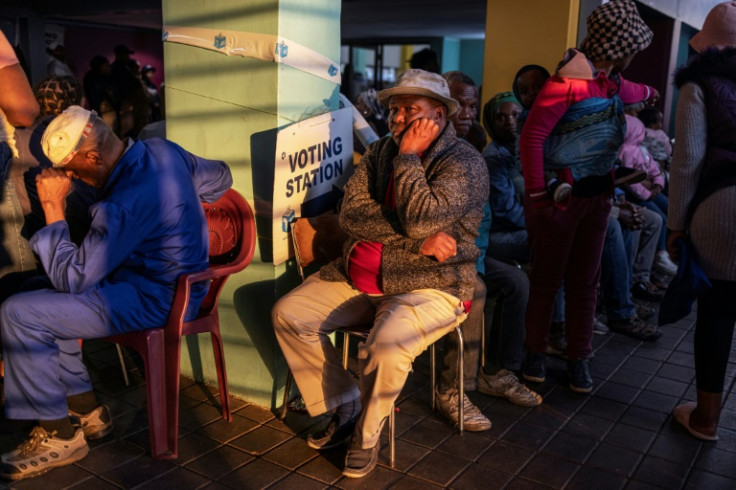 Voters grumbled about poor organisation but many insisted they would wait as long it takes to vote for change