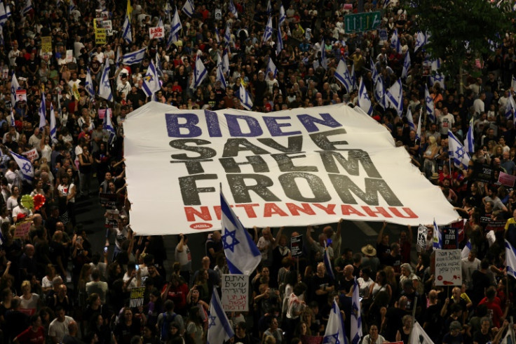 Relatives and supporters of Israelis held hostage by Palestinian Hamas militants in Gaza demonstrate to call for their release in Tel Aviv on June 1, 2024