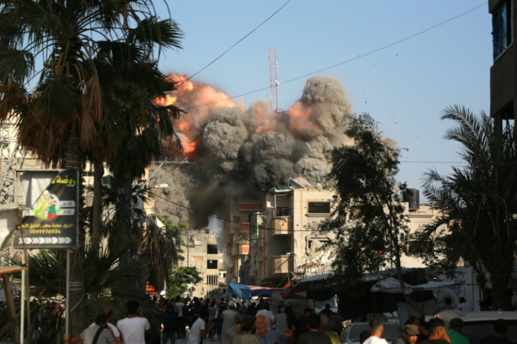 A ball of fire and black smoke rises moments after an Israeli air strike targeted a residential building in Bureij in central Gaza on June 3, 2024