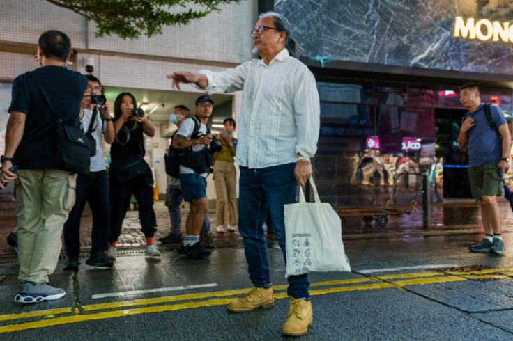 On the eve of the anniversary, local artist Sanmu Chen was briefly detained after he appeared to trace the Chinese characters of "8964" in the air