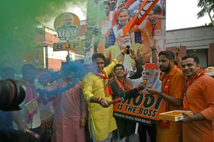 Celebrations at India's ruling BJP party headquarters saw Hindu faithful followers party, but minorities including the country's 200-million-plus Muslims are more worried at their return to power