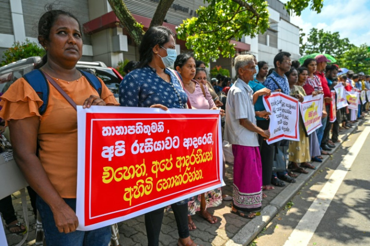Protesters near the Russian embassy in Colombo seeking the release of Sri Lankan ex-soldiers who joined forces fighting in Ukraine after Russia's invasion