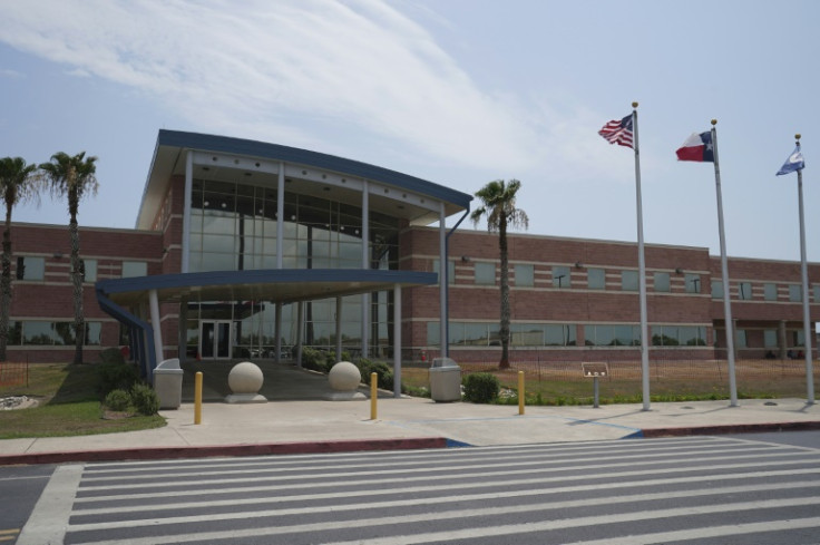 The Port Isabel Detention Center holds only men, who are classified and given a color to wear based on their status
