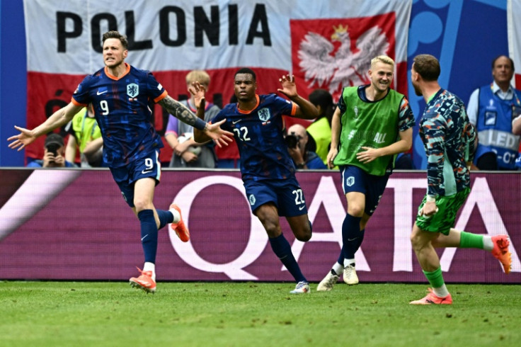 Wout Weghorst (L) was the Dutch hero against Poland