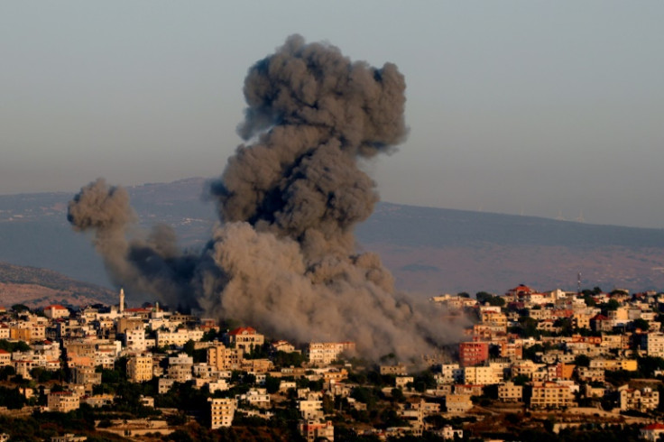Black smoke billows following an Israeli air strike that targeted a house in the southern Lebanese village of Khiam on June 21, 2024