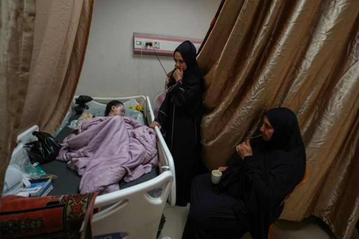 Palestinian girl Hanan Akl, 9, who was injured in Israeli bombardment, is treated at the Al-Aqsa Martyrs hospital in Deir el-Balah in the central Gaza Strip on June 22, 2024