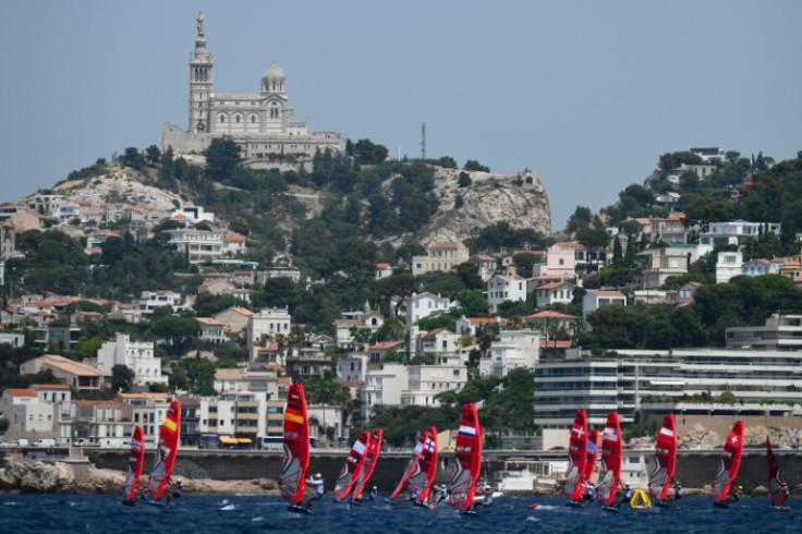 Windsurfers compete at the marina in Marseille where the Olympics sailing events will take place