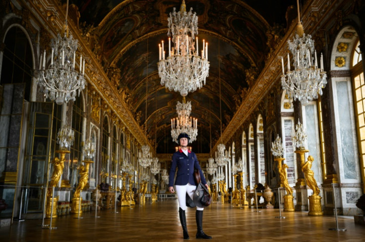 French show jumper and reigning Olympic champion Penelope Leprevost poses in the Hall of Mirrors in the Chateau de Versailles