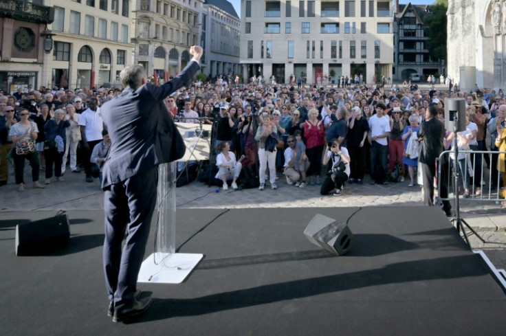 French people attend a campaign meeting with Raphael Glucksmann, a rising star of the left, in Rouen, northwestern France