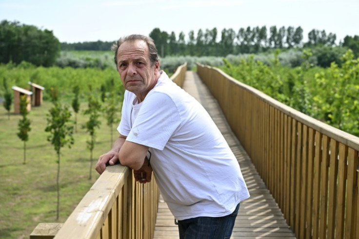 Whistleblower, pensioner Zoltan Palfi, says some are angry about the village's sudden notoriety