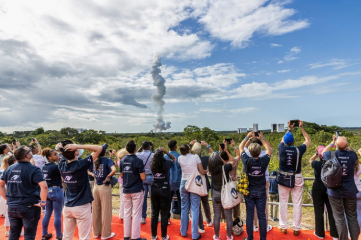 Spectators watch Ariane 6 take-off