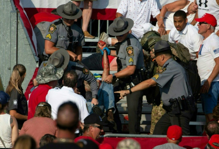 Chaos and injuries after guns were fired at Republican candidate Donald Trump at a campaign event