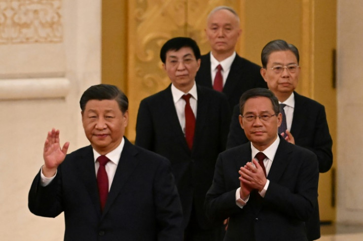 China's President Xi Jinping (L) and other top officials are gathering for the party's secretive Third Plenum on Monday