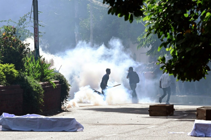 Bangladesh police fire tear at protesting students at Dhaka University in the capital on July 17