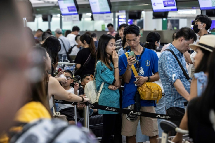 Passengers in airports around the world learned their flights had been delayed
