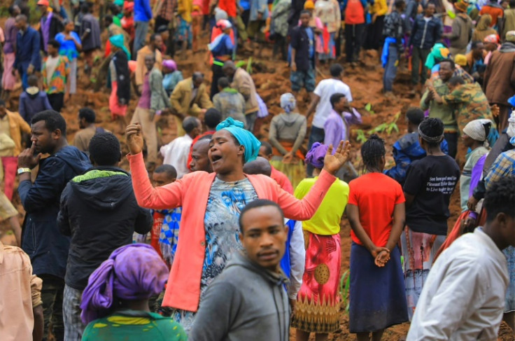 Officials say most of the victims were buried after rushing to help others hit by a first landslide