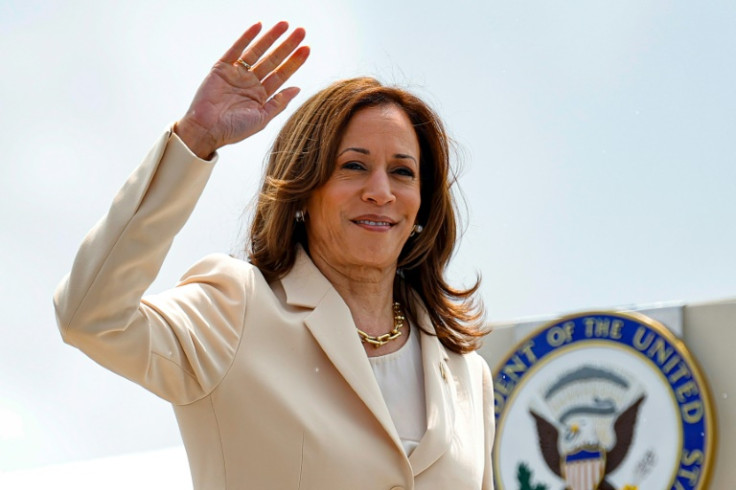 US Vice President and Democratic Presidential candidate Kamala Harris waves as she boards Air Force Two at Indianapolis International Airport in Indianapolis, Indiana, on July 24, 2024. Harris travels to Houston, Texas, where she is scheduled to speak at