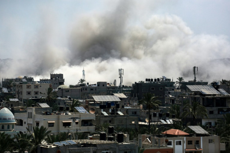Smoke rises during an Israeli strike in Deir el-Balah, central Gaza