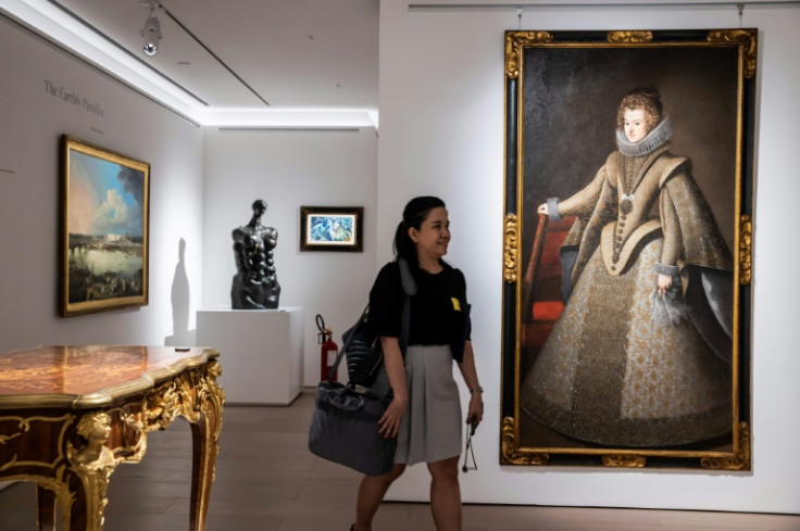 The auction houses are unfazed by the city's political situation, which critics say has creating a hostile environment for artistic expression