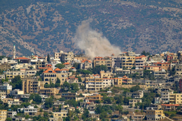 Smoke billows from a site targeted by Israeli shelling in the southern Lebanese border village of Khiam