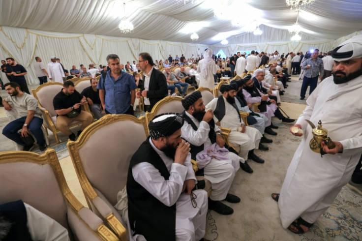 Mourners in the Qatari capital Doha at the funeral of slain Hamas political leader Ismail Haniyeh