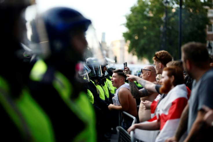 False information spread in the wake of the killings sparked violent protests in several cities