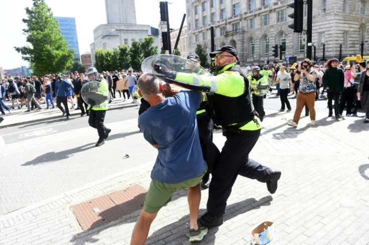 Merseyside Police said 'a number of officers have been injured as they deal with serious disorder' in Liverpool