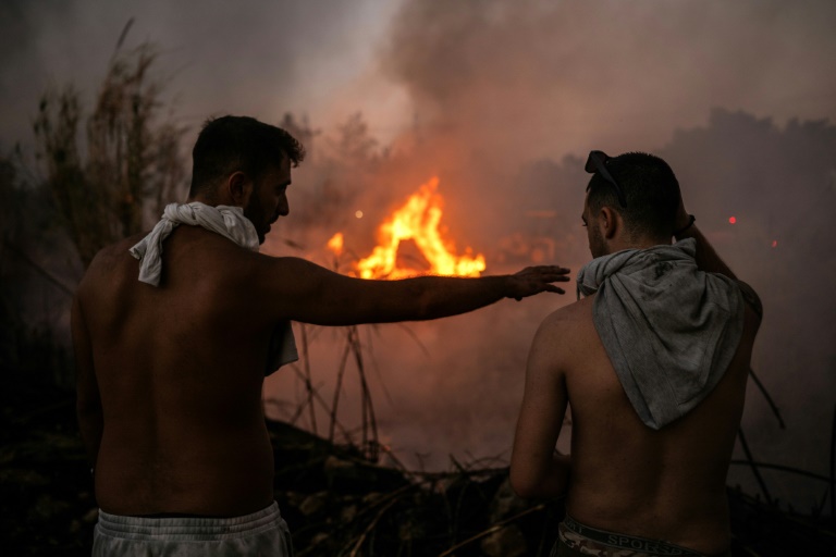 Greek Firefighters Calm Deadly Athens Inferno