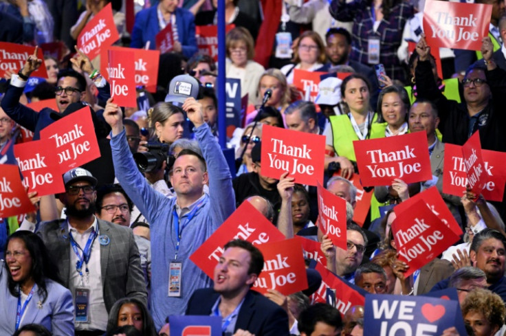 Delegates held up signs reading 'We love Joe' and 'Thank you Joe' for US President Joe Biden's convention speech