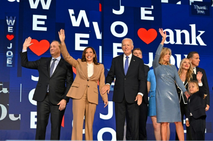 In an emotional speech, US President Joe Biden (C) chronicled the highlights of his time in the White House, heaping praise on his Vice President Kamala Harris