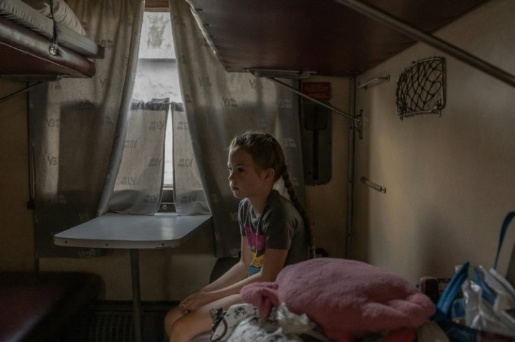 Alona, 8 years old, who together with her mother Yulia and brother Oleg evacuated from the town of Novogrodivka, located not far from the frontline