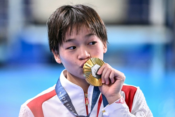 Olympic diving gold medallist Quan Hongchan has been the focus of intense interest from obsessive fans, who have mobbed her rural home town