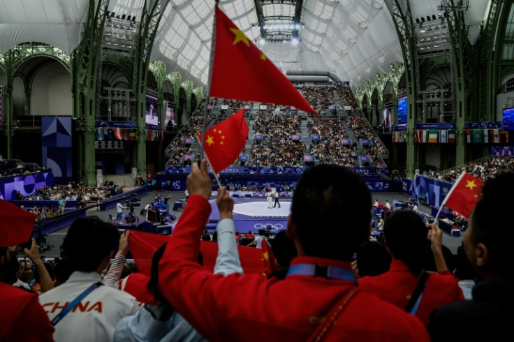 Chinese supporters cheer their athletes at the Paris Olympics