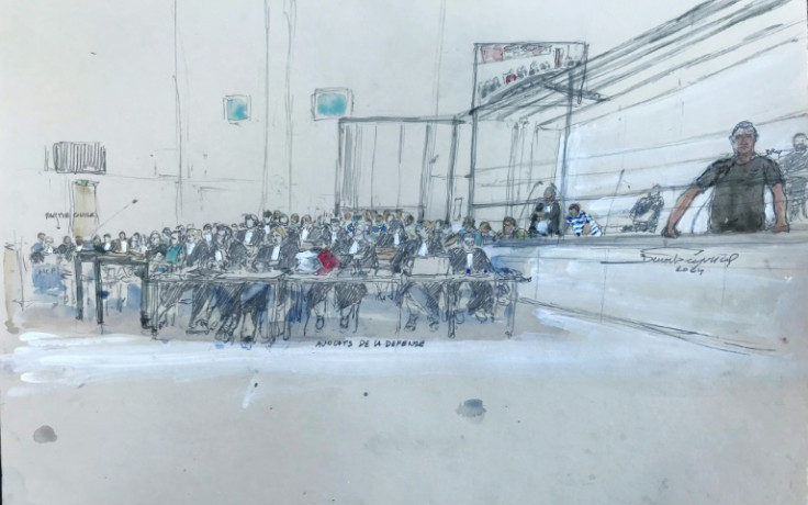 Eighteen of the 51 accused including Dominique P. are in custody, while 32 other defendants are attending the trial as free men