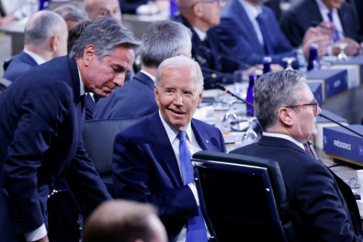 US President Joe Biden speaks with US Secretary of State Antony Blinken during the NATO summit in Washington in July 2024
