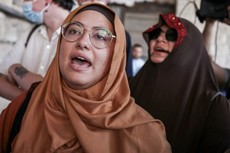 Palestinians and international activists react at a final farewell for slain Turkish-American activist Aysenur Ezgi Eygi in Nablus in the occupied West Bank