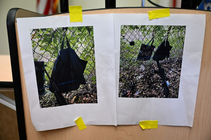 Pictures of evidence found at former US president Donald Trump's golf course are shown at a press conference in West Palm Beach, Florida, after an apparent assassination attempt against him