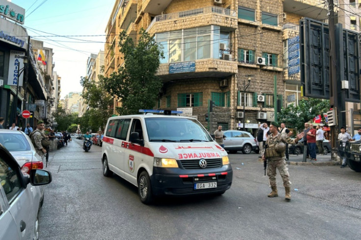 An ambulance rushes wounded people to hospital in Beirut on September 17, 2024, after explosions hit Hezbollah strongholds