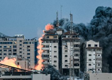 October 7, 2023: a ball of fire and smoke after an Israeli air strike hits the Palestine Tower in Gaza City