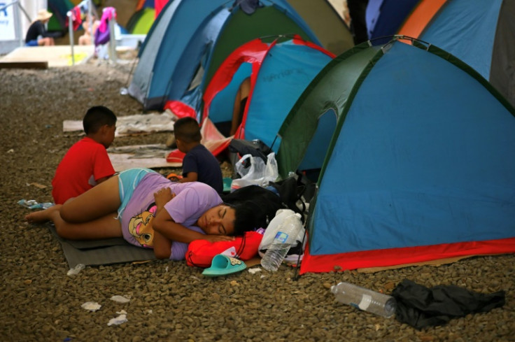 Many migrants arrive exhausted at this temporary reception center for migrants in Lajas Blancas, Panama after an arduous trek from Colombia through the dense Darien jungle